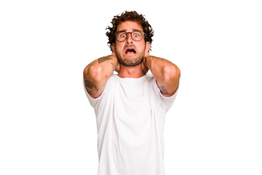 Young caucasian curly hair man isolated Young caucasian man with curly hair isolated screaming with rage.