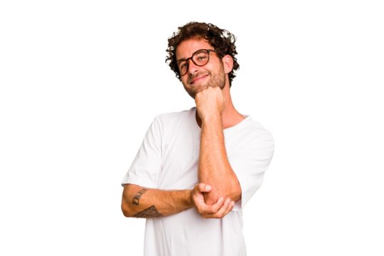 Young caucasian curly hair man isolated Young caucasian man with curly hair isolated smiling happy and confident, touching chin with hand.