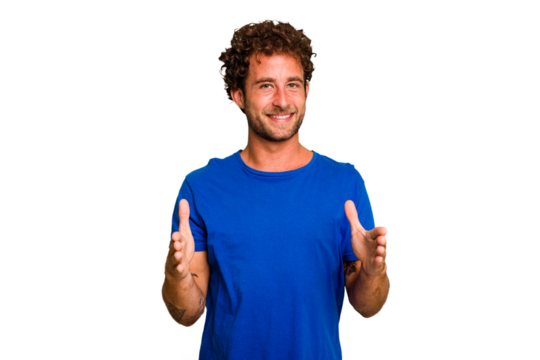 Young caucasian curly hair man isolated Young caucasian man with curly hair isolated holding something with both hands, product presentation.