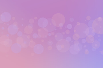 shiny blurred bokeh holiday lights on pastel pink, blue and purple background