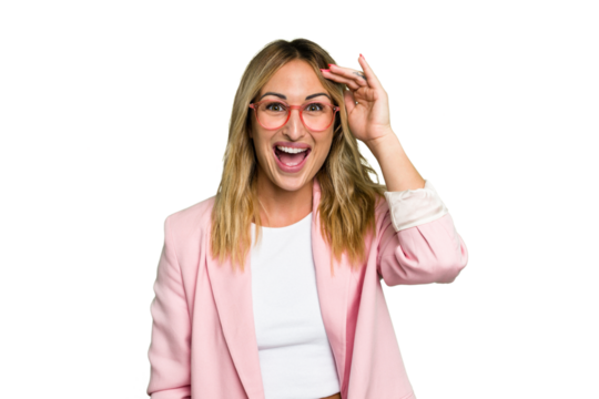 Young caucasian woman isolated on green chroma background shouts loud, keeps eyes opened and hands tense.