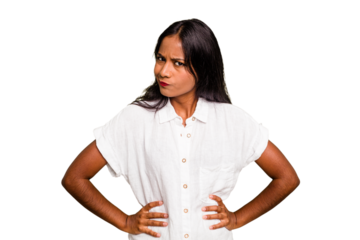 Young Indian woman isolated confused, feels doubtful and unsure.