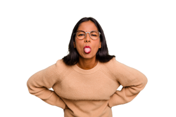 Young Indian woman isolated funny and friendly sticking out tongue.