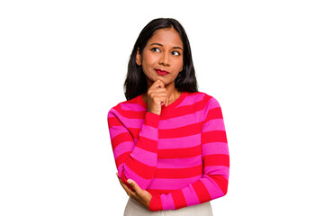 Young Indian woman isolated looking sideways with doubtful and skeptical expression.