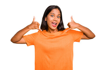 Young Indian woman isolated showing a mobile phone call gesture with fingers.