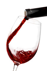 Pouring Red Wine into a Glass - Isolated
