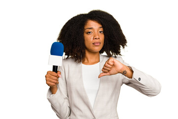 Young TV presenter African American woman with a microphone isolated showing a dislike gesture, thumbs down. Disagreement concept.