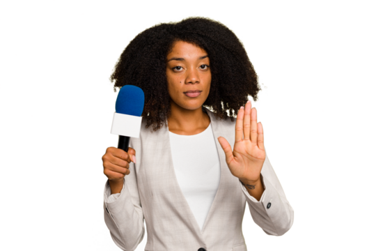 Young TV presenter African American woman with a microphone isolated standing with outstretched hand showing stop sign, preventing you.