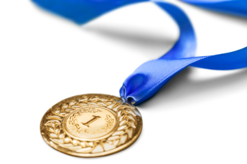 Gold medal with  ribbon  on  background