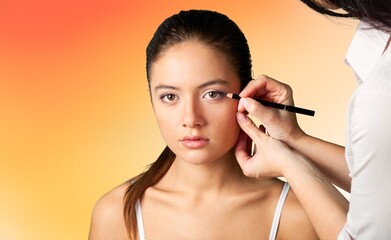 Bautiful young girl and tools for makeup