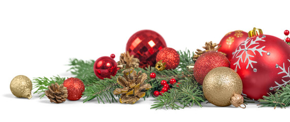 Christmas decorations with  tree branches and  baubles  isolated on white background