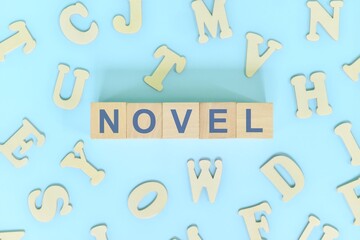 Novel narrative form in english literature concept. Wooden blocks typography word flat lay in blue background.