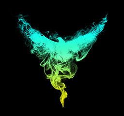 Silhouette of a flying eagle with spread wings in beautiful puffs of smoke isolated on a black background. Silhouette of a flying eagle in clouds of smoke with a beautiful gradient.