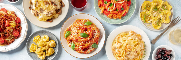 Pasta panorama. Assortment of Italian pastas, with spaghetti in tomato sauce and Bolognese, seafood...