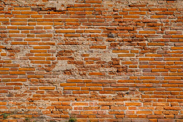 Brick wall background that is over 100 years old