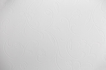 Light background of decorative plaster with abstract spots. Unusual texture of white or gray wall with beautiful patterns, creative surface background. Finishing coating for building cladding.