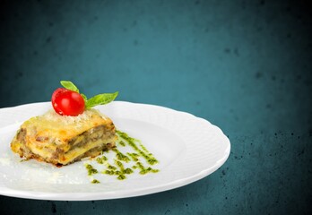 Tasty fresh lasagna dish on white plate