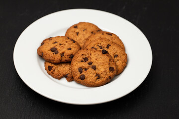 few fresh tasty cookies with chocolate chips