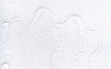 Hyaluronic acid or collagen gel close up. Textured background with oxygen bubbles in cosmetics. Moisturizing serum for the skin.