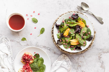 Pomegranate and persimmon salad with vinaigrette