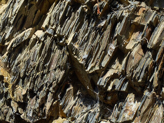 Stone wall. Layered rock. Sedimentary rocks.