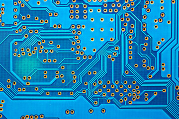 High tech blue electronic circuit board background, close up