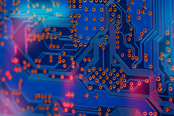 High tech blue electronic circuit board background, focus point
