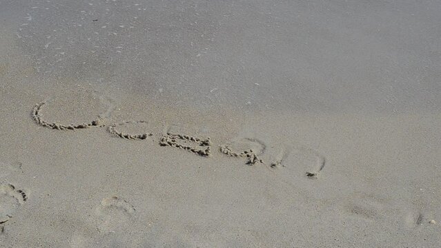 Inscription ocean. The inscription the ocean is washed