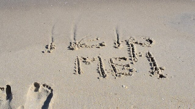 The inscription of help Me washes off. Caption help