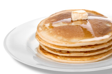 Stack of tasty pancakes with butter on a white plate