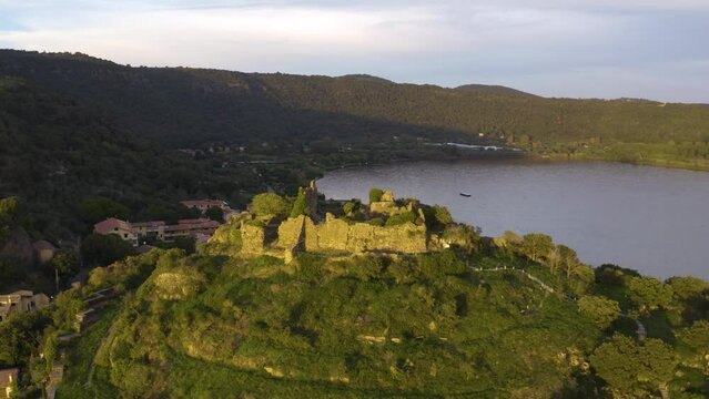 Aerial Orbiting Shot Above Beautiful Orsinis Fortress in Trevignano Romano on Lake Bracciano