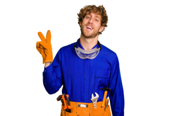 Young caucasian electrician man isolated on white background joyful and carefree showing a peace symbol with fingers.