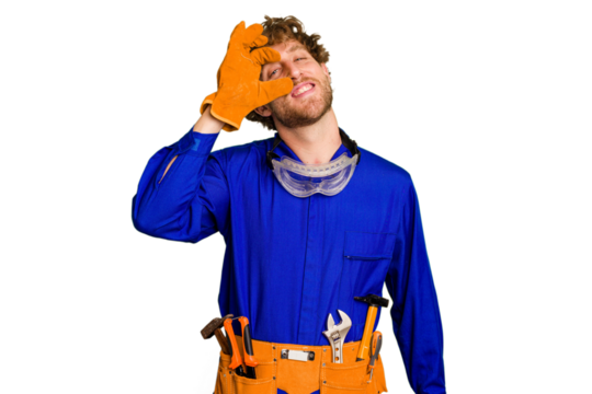 Young caucasian electrician man isolated on white background excited keeping ok gesture on eye. - Powered by Adobe