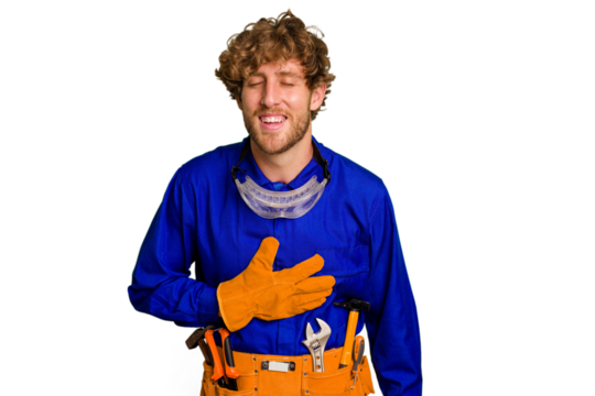 Young caucasian electrician man isolated on white background laughing and having fun.
