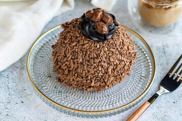 Chocolate cake. Bakery products. Chocolate cake inside and outside on a gray background. close up