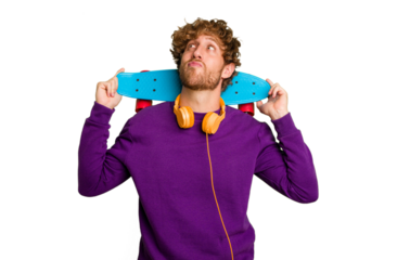 Young skater caucasian man isolated on white background