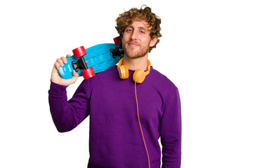 Young skater caucasian man isolated on white background © Asier