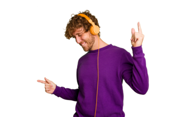 Young man listening to music with headphones