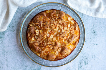 Hazelnut cake. Homemade cake on gray background. close up