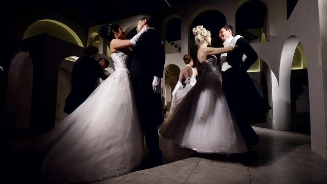 amazing fairytale royal ball in palace, women and men are waltzing in ballroom, dancing in night