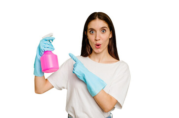 Young cleaner woman isolated pointing to the side