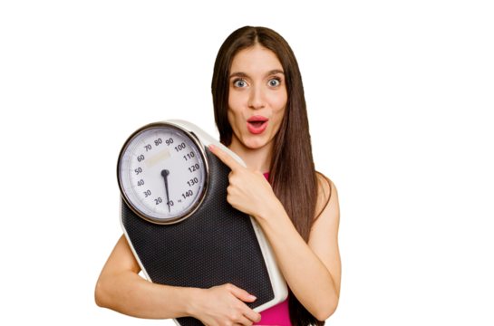 Young caucasian woman holding a scale isolated pointing to the side