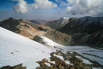 Fotobehang View of the mountain peaks and glaciers of Kyrgyzstan. © Evgeniya brjane