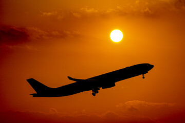 airplane in the sunset