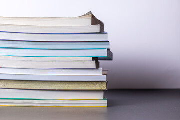 Stacked books with white background
