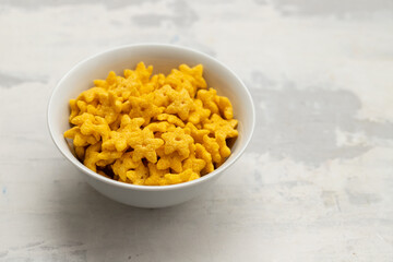 dry fresh corn stars in white bowl on ceramic