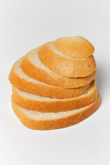 pieces of bread on top of each other on a white background