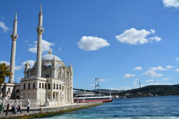 Fototapeta na wymiar Istanbul city, mosque, bridge, water view, sky and clouds