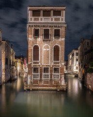 Fototapeta na wymiar the Tetta Palace in Venice in color long exposure photography at night