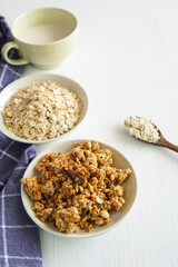 Granola with oats in small plate.